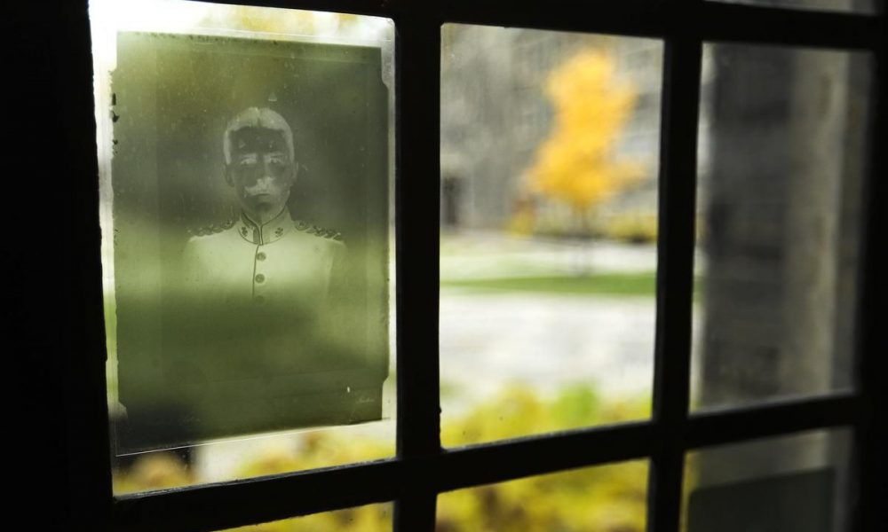First World War soldiers and nurses are a ghostly presence in Trinity College windows
