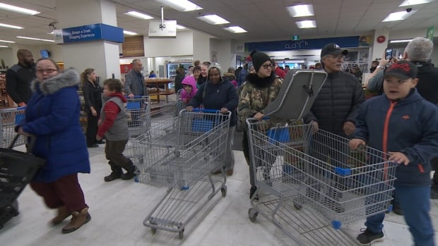 Iqaluit residents line up as city’s largest grocery store reopens after fire