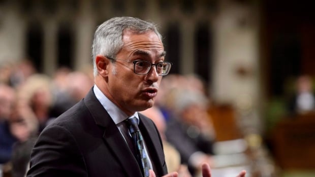 Two men charged in Ivory Coast for trying to blackmail MP Tony Clement