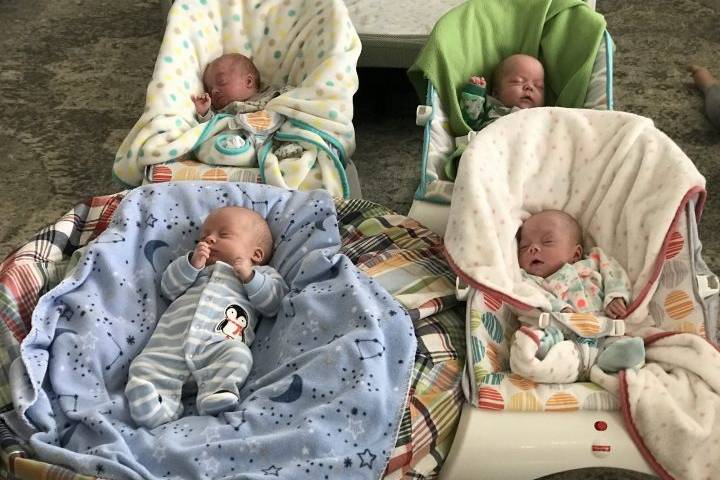 Fort McMurray quadruplets given green light to go home