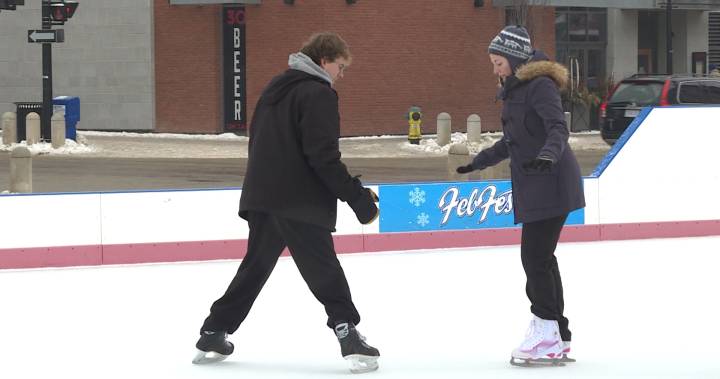 Adults learn to ice skate at Kingston’s Market Square – Kingston
